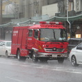 Kyoto firefighters under rain