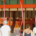 Nixx tolls the bell at Fushimi Inari shrine